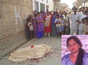 The body of Suman (inset), who was stabbed to death, lies in a street in the Arya Nagar locality in Abohar on Tuesday. 