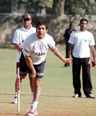 Sachin Tendulkar bowls during a practice session in Mumbai on Wednesday