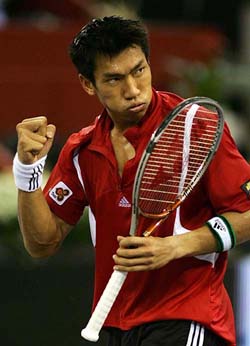 Paradorn Srichaphan of Thailand celebrates after beating Alex Corretja of Spain at the Madrid Masters tennis tournament