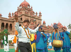 Pakistani artistes dance with the bhangra team