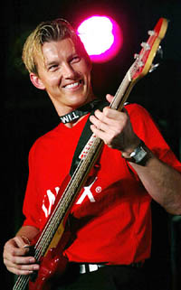 Brett Lee strums a guitar during a party in Mumbai on Wednesday.