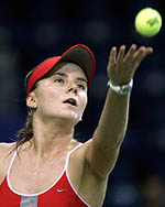 Daniela Hantuchova of Slovakia serves to Maria Sharapova of Russia