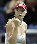 Maria Sharapova of Russia celebrates after defeating Daniela Hantuchova
