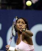 Venus Williams of the US plays a forehand