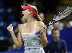 Maria Sharapova of Russia celebrates after winning the quarterfinal match