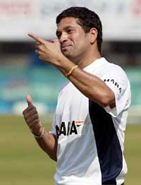 Sachin Tendulkar gestures during a practice session at the VCA Stadium in Nagpur