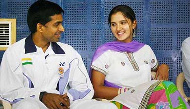 Ace shuttler Pullela Gopichand shares a light moment with tennis player Sania Mirza during the opening of the Asian Satellite badminton tournament