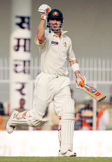 Damien Martyn celebrates his century on the first day of the third Test between India and Australia