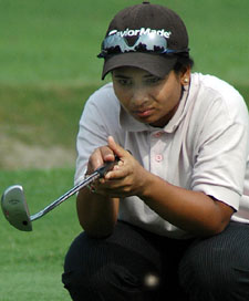 Anjali Chopra of Delhi lines up a putt on the 18th hole during the Punjab Open Ladies Amateur Golf Championship in Chandigarh