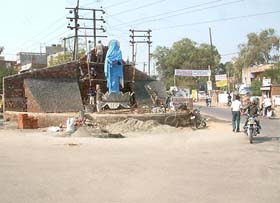 An unauthorised temple being raised on the Wagah-Ram Tirath road in Amritsar