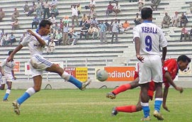 Naushad Pari from Kerala scores his team's second goal against Services in the 1st semifinal of the Santosh Trophy at the Ambedkar stadium in New Delhi 