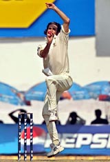 Jason Gillespie bowls on the fourth day of the third Test between India and Australia in Nagpur