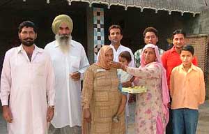 Family members of Mr Jagroop Singh Brar of Deon village in Bathinda district celebrate his victory in a British Columbia, Canada, byelection.