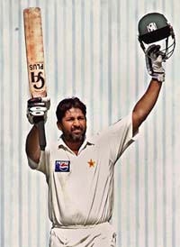 Pakistani batsman Inzamam-ul-Haq celebrates his century against Sri Lanka on the third day of their Test, on Saturday in Karachi