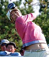 Defending champion South Korean Ahn Shi-hyun watches the flight of her shot on the 18 hole during the final round of the CJ Nine Bridges Classic on Jeju Island, South Korea, on Sunday.  Ahn finished at 10-under 206 and placed fourth, along with two other players. 