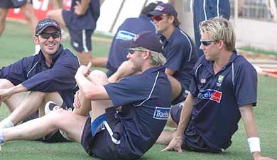 Australian players share a light moment during a practice session at Mumbai's Wankhede stadium 