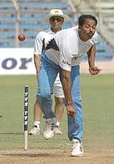 Team India's cricket consultant Sunil Gavaskar watches Bengal speedster S.S. Paul bowl during a practice session in Mumbai 