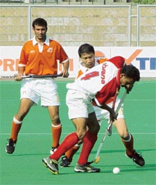 A league match of the 21st Surjit Hockey Tournament between Punjab Armed Police and Indian Airlines in progress at Jalandhar