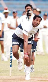 Pace bowler S S Paul bowls at the nets on the eve of the fourth and final Test at Wankhede Stadium in Mumbai