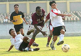 Mohan Bagan's James Agbo Ugwu tries to control the ball during their match against Assam Rifle 