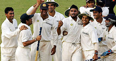 Indian players celebrate their win over Australia in the final Test in Mumbai