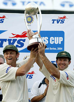 Australian captain Ricky Ponting and Adam Gilchrist hold the Border-Gavaskar Cup in Mumbai