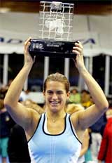 Amelie Mauresmo of France holds up her trophy after defeating Vera Zvonareva of Russia in the Advanta Championship, in the USA, on Sunday. Mauresmo won 3-6, 6-2, 6-2. 