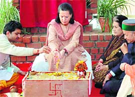 Mrs Sonia Gandhi, Chairperson of the UPA, at bhoomi pujan of Himachal Congress Bhavan in Shimla on Wednesday. Also in the picture are Mr Virbhadra Singh, Chief Minister, and Mrs Vidya Stokes, HPCC chief.