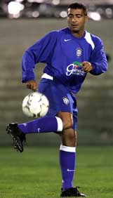 Brazilian soccer star Romario de Souza Faria controls the ball during practice at the Coliseum in Los Angeles on Tuesday. 