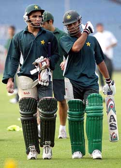 Pakistani batsmen Taufeeq Umar (left) and Imran Farhat return to the dressing room 