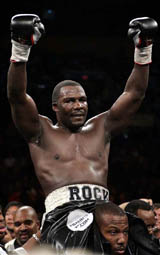 Hasim Rahman celebrates after beating Kali Meehan by technical knock-out in the fourth round at New York's Madison Square Garden 
