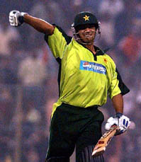 Pakistan batsman Salman Butt celebrates after reaching his century against India at the Eden Gardens in Kolkata on Saturday