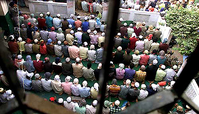 People offer prayers on the occasion of Id in Amritsar on Monday
