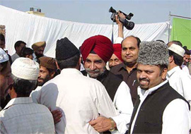 Mr Tripat Rajinder Singh Bajwa, Chairman of the PPCB, greets Ahmadiya Muslims on the occasion of Id in Gurdaspur on Monday. 