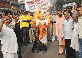 Activists of the Shiv Sena (Hindustan) burn an effigy of Union Home Minister Shivraj Patil in protest against the arrest of Shankaracharya Jayendra Saraswati in Jalandhar on Tuesday.