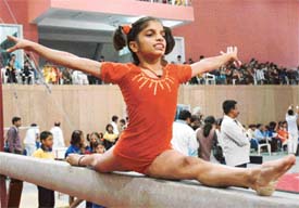 Shalu Mishra of Uttar Pradesh performs on the balancing beam during the 18th National Sub-Junior Gymnastics Championship at Mohali on Tuesday