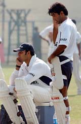 Indian cricketers Gautam Gambhir  and V V S Laxman during the nets on the eve of the first Test at Kanpur