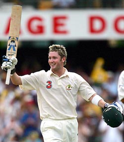 Australia's Michael Clarke celebrates after scoring a century
