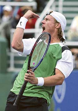 Lleyton Hewitt of Australia rejoices during his semifinal win over Andy Roddick of the USA at the Tennis Masters Cup at Westside Tennis Club in Houston