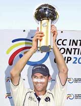 Scotland�s cricket captain Craig Wright holds the cup after victory over Canada in the ICC Inter-Continental Cup tournament in Sharjah
