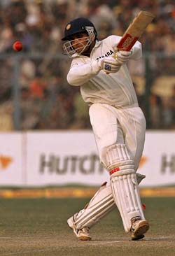 Indian cricket captain Sourav Ganguly hits a six during the fourth day's play of the first Test between India and South Africa in Kanpur