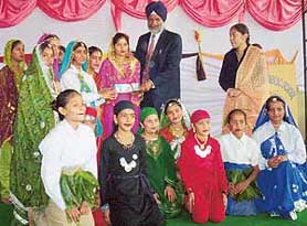 The MLA of Samana distributes prizes among children on the occasion of the annual prize distribution function at Mata Gujri Public School in Patiala on Wednesday.