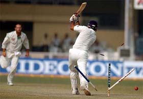 India's Zaheer khan is clean bowled by South African bowler Andrew hall on the last day of the first Test in Kanpur on Wednesday