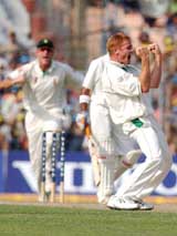 Shaun Pollock celebrates taking the wicket of Gautam Gambhir during the second Test on Monday
