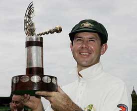 Australian captain Ricky Ponting holds aloft the Trans-Tasman trophy after defeating New Zealand by 213 runs in the second cricket Test in Adelaide, Australia, on Tuesday