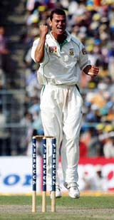 South African bowler Zander de Bruyn celebrates after taking the wicket of Sourav Ganguly 