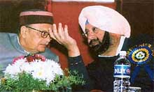 Punjab Chief Minister Amarinder Singh discusses a point with Arjun Singh, Union Minister for Human Resources, at the inauguration of the World Punjabi Conference at Punjabi University, Patiala