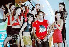 Indian hockey player Gagan Ajit Singh walks the ramp during a fashion show where the logos and jerseys of Tier I Premier Hockey League teams were unveiled