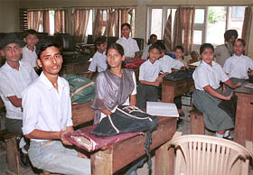 Deaf and dumb children attending classes in the meeting room of the Small Savings Department