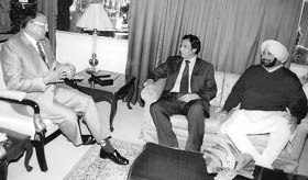 The Punjab Governor, Gen S.F. Rodrigues (retd), interacts with Chaudhry Pervaiz Elahi, Chief Minister of Pakistan, at Punjab Raj Bhavan
